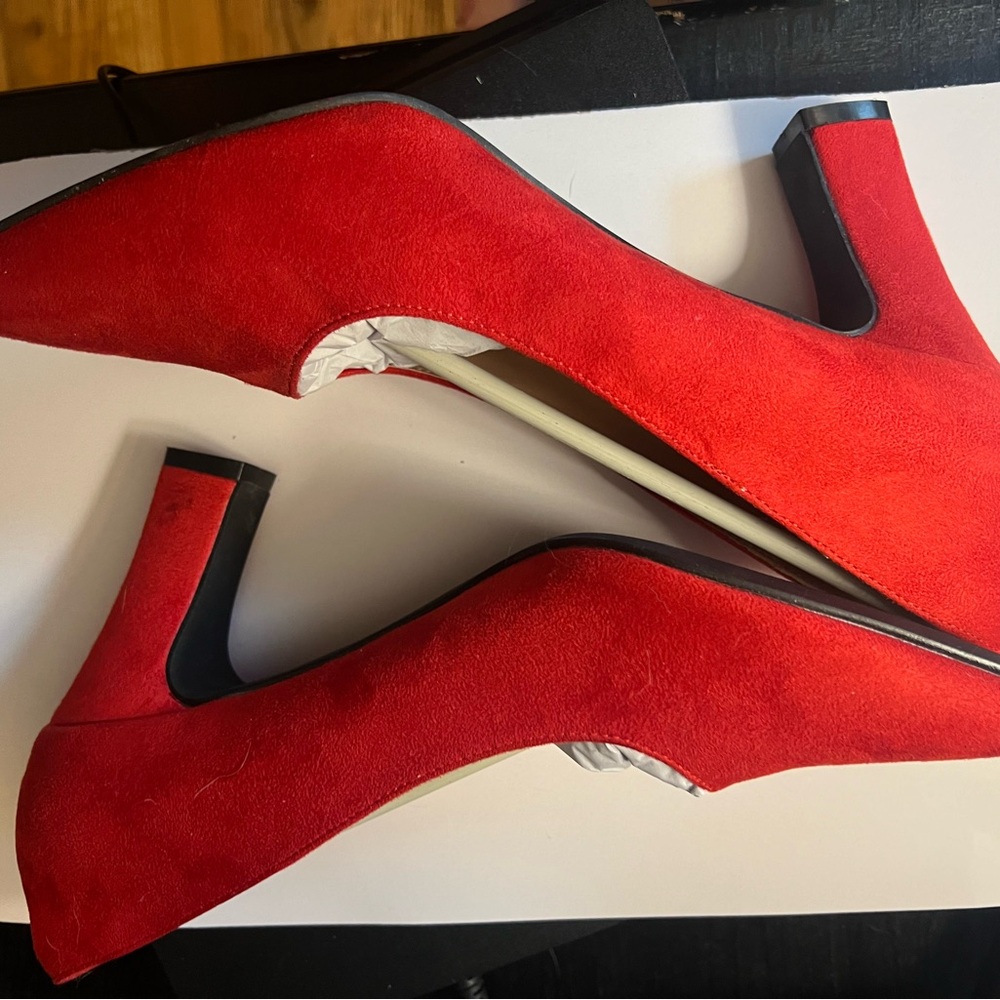 Never worn velvet red pumps